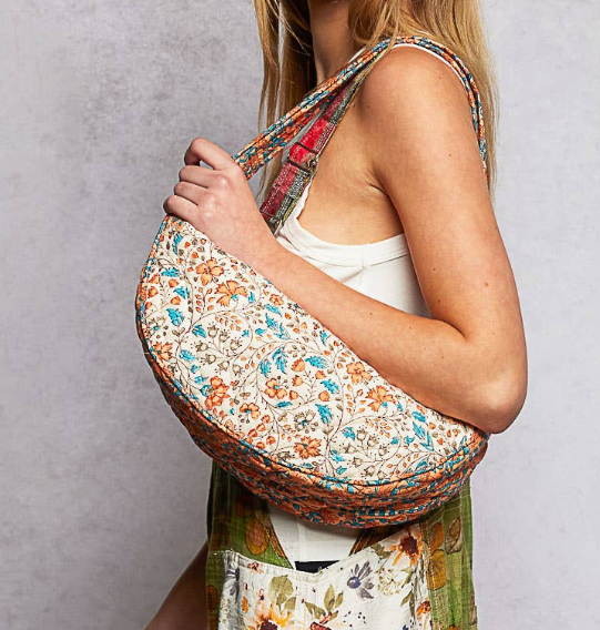 Ethnic-style quilted half-moon crossbody bag