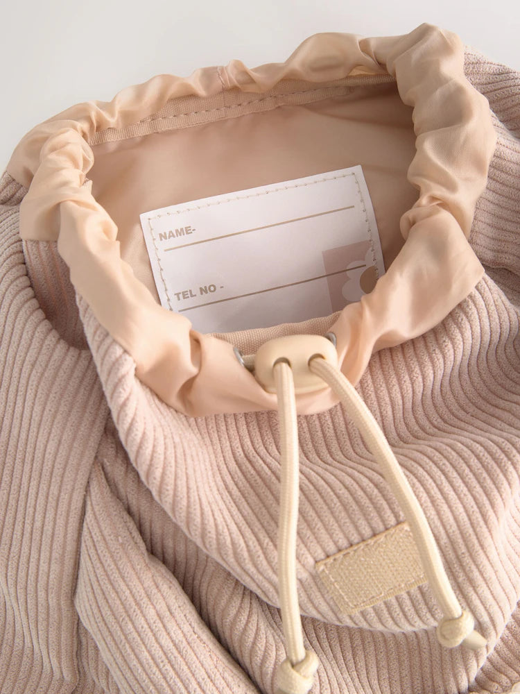 Cream-colored cat backpack