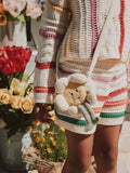 White flower-shaped plush crossbody bag