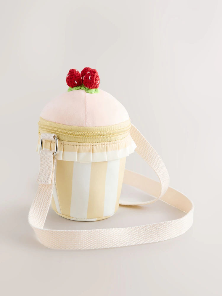 Pink cupcake-shaped crossbody bag