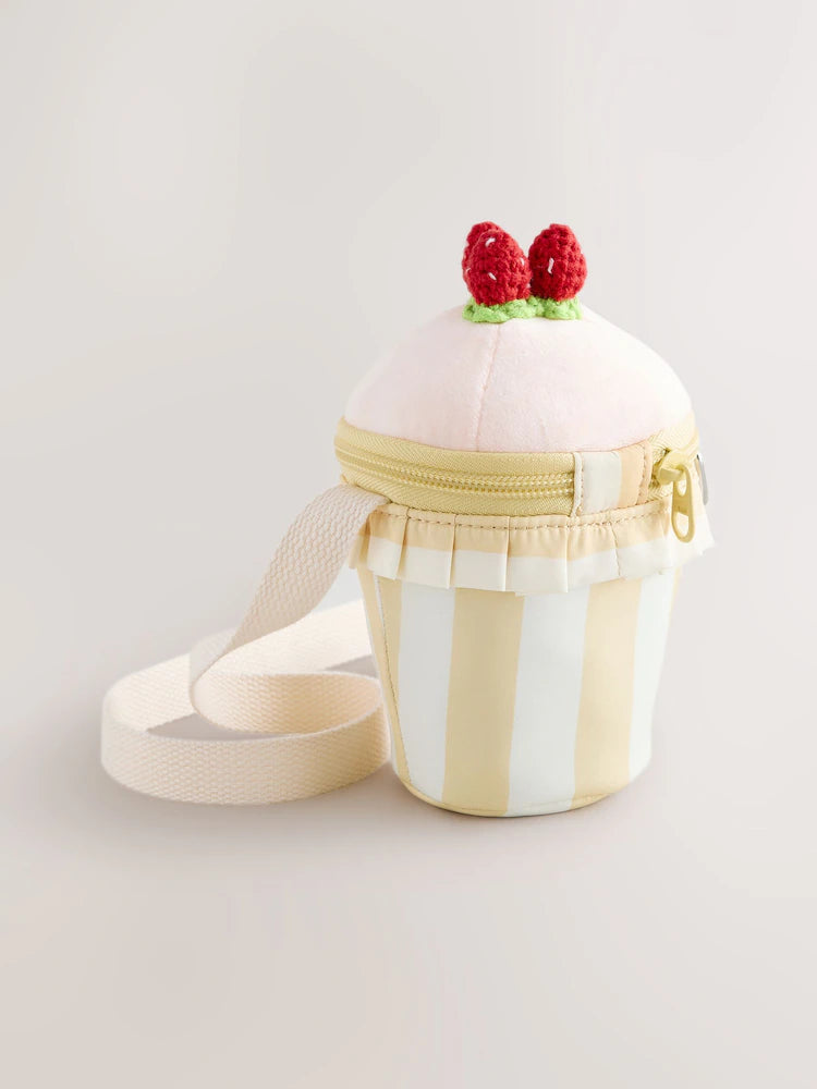 Pink cupcake-shaped crossbody bag