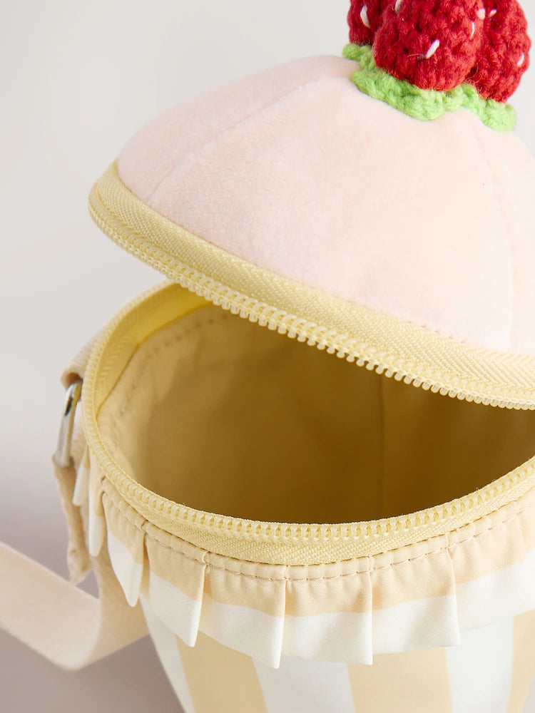 Pink cupcake-shaped crossbody bag
