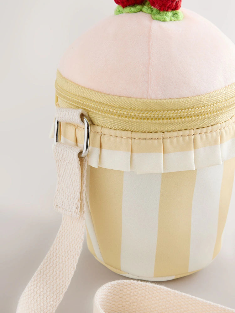 Pink cupcake-shaped crossbody bag