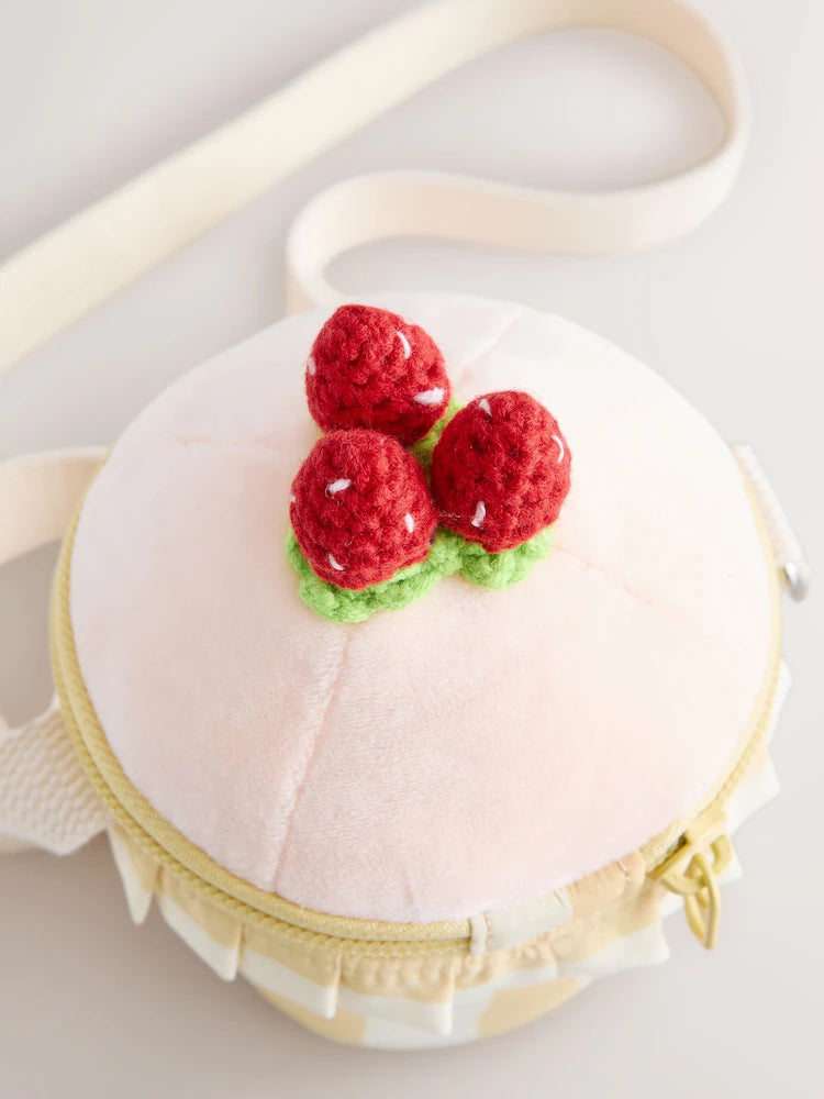 Pink cupcake-shaped crossbody bag